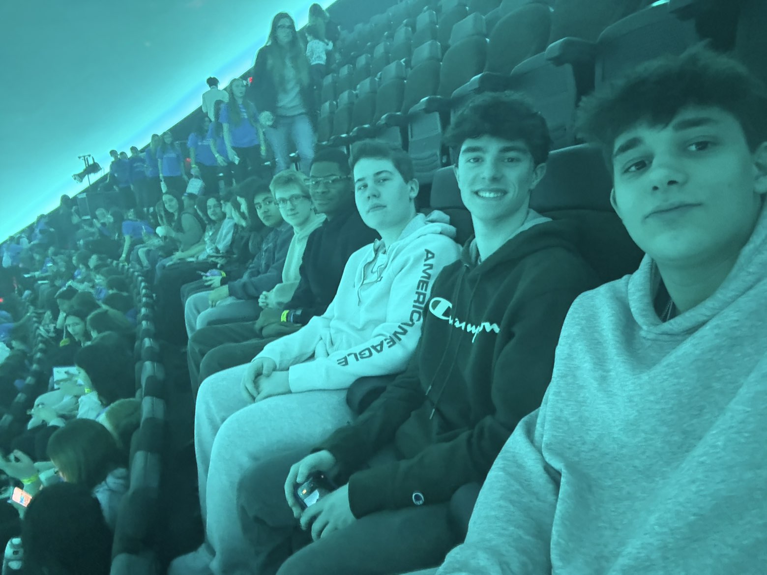 Classmates inside the planetarium